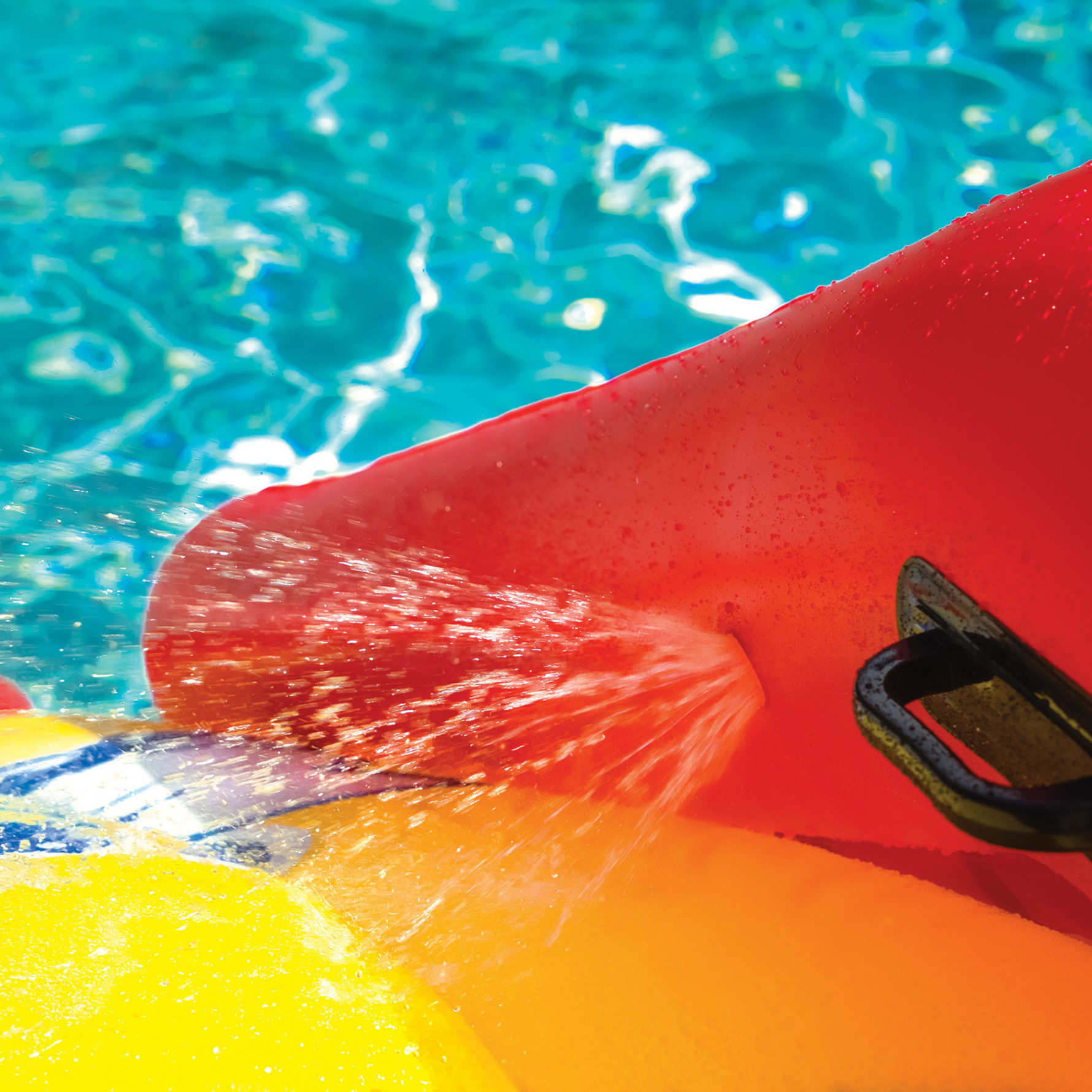 WOW Sports Slide N Smile Inflatable Pool Slide with Sprinklers for